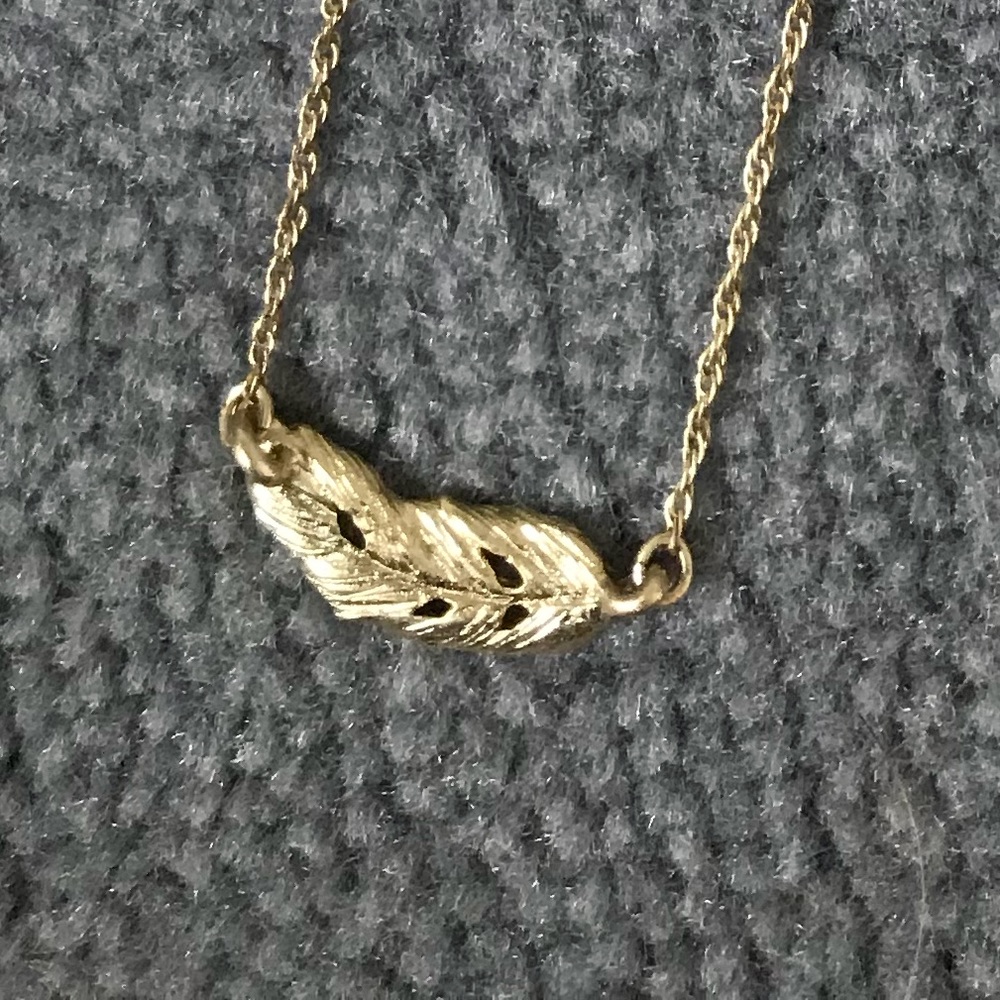 Gold feather necklace